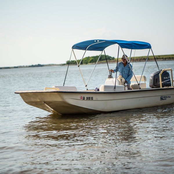 Captain John pulling the boat up to shore