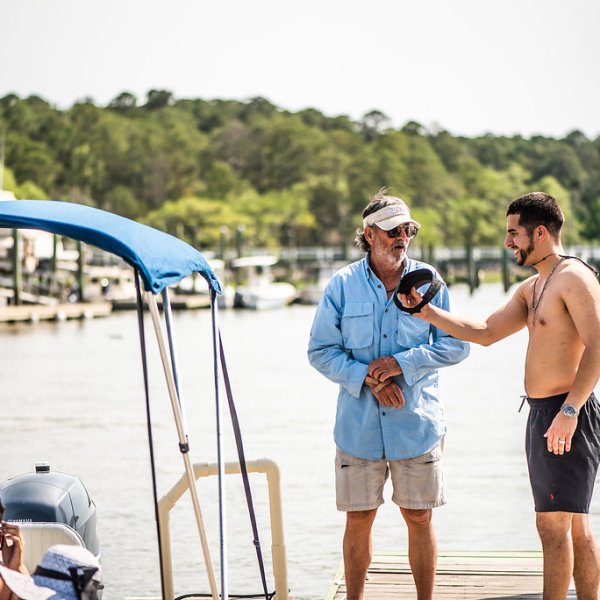 Captain John with a client