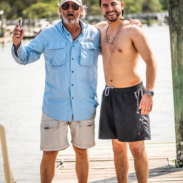 Captain John with a happy client