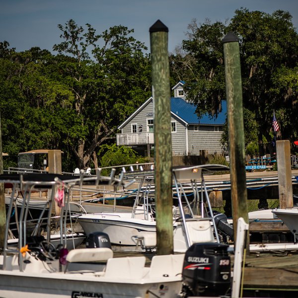 view of the boats docked in the harbor