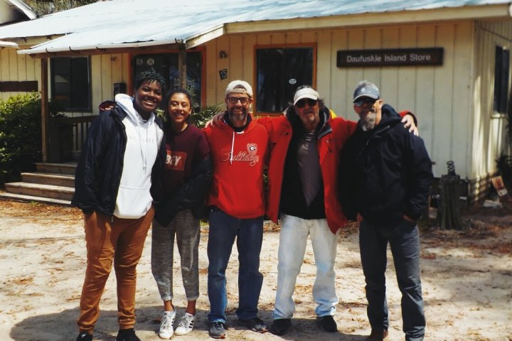 group of happy clients after a successful tour