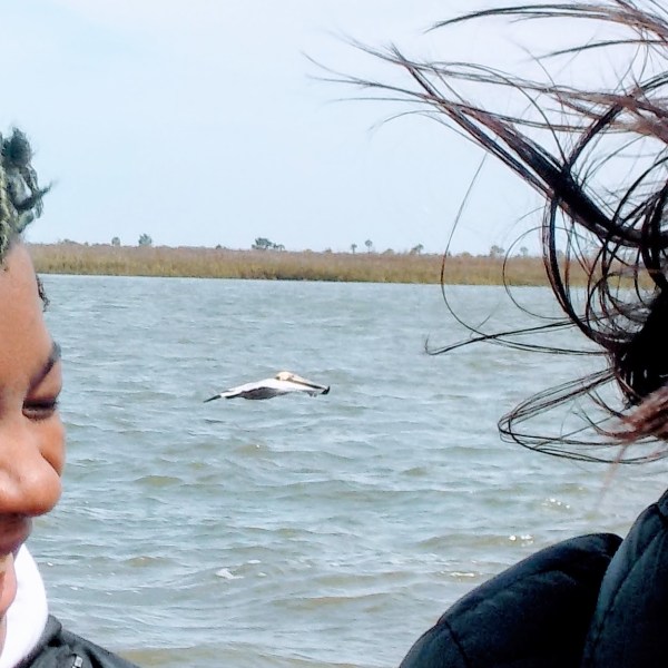 two people laughing on the boat