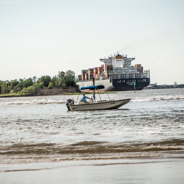 cruising near ocean transport ships