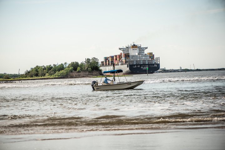 cruising near ocean transport ships