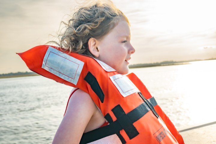 a little girl in a body of water